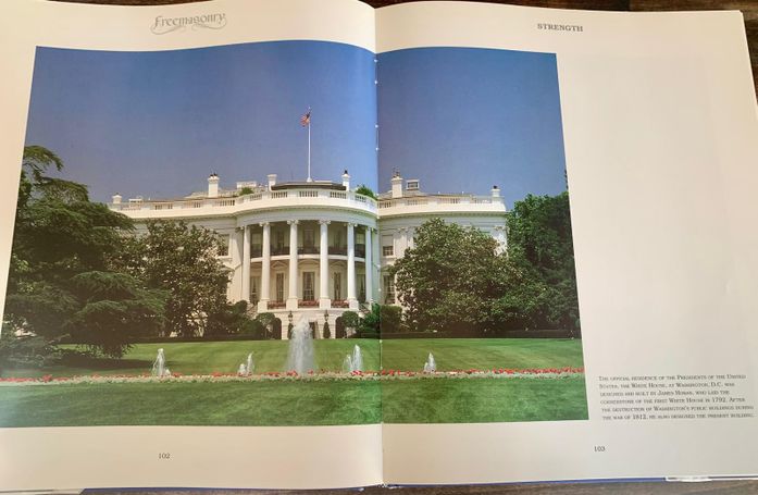 Two-page spread featuring a full-page color photograph of the south facade of the White House and its manicured lawn.
