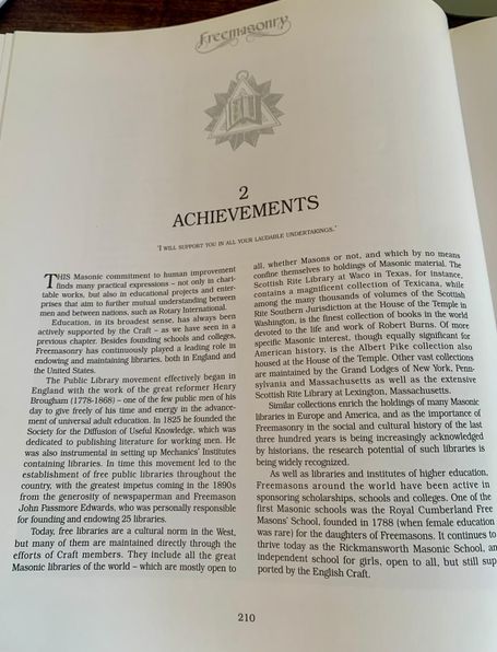 Book page for Section 2 titled "ACHIEVEMENTS" featuring a square and compass emblem surrounding an open book.